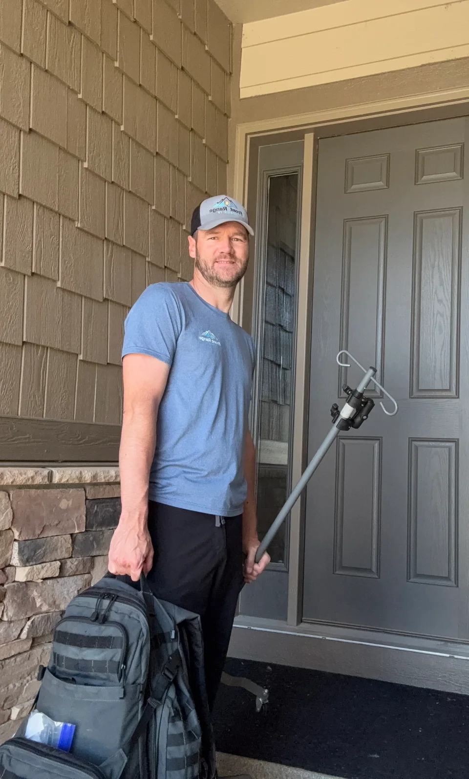 Front Range Mobile IV provider arriving with a supply bag and IV stand